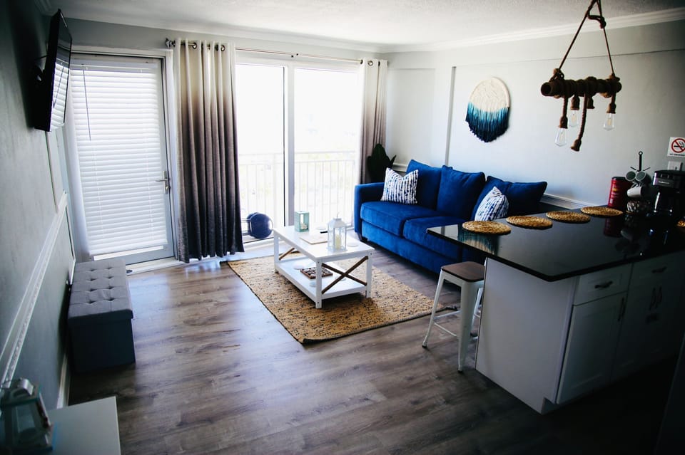 living room with sofa queen gel pull out. 