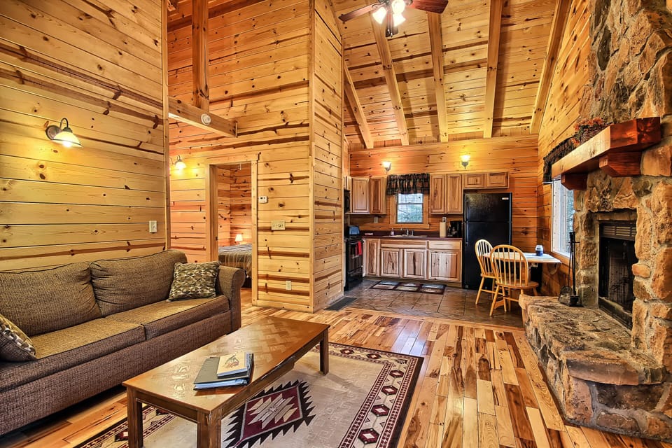 Grant's Escape - Living Room, with Wood-Burning Fireplace, looking into Kitchen