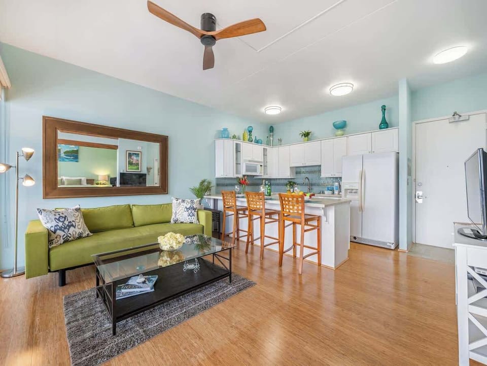Living room and kitchen with counter top