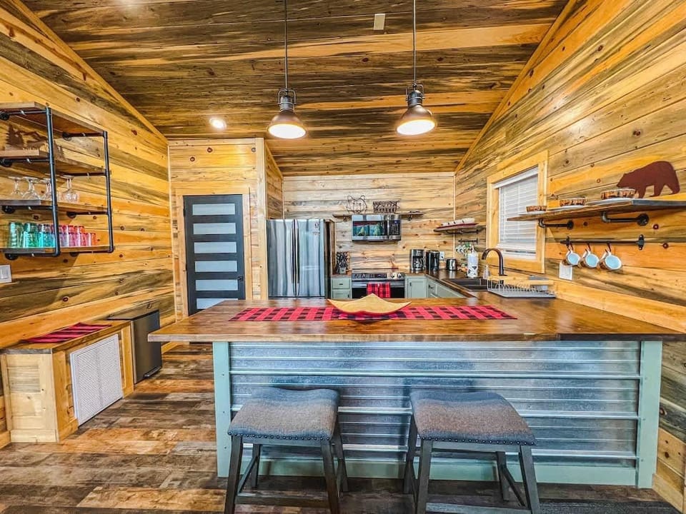 As you enter the View-topia, you'll be welcomed by our open kitchen fully stocked with all your cooking essentials. All you need is the food! We include coffee makers, blender, toaster, etc.