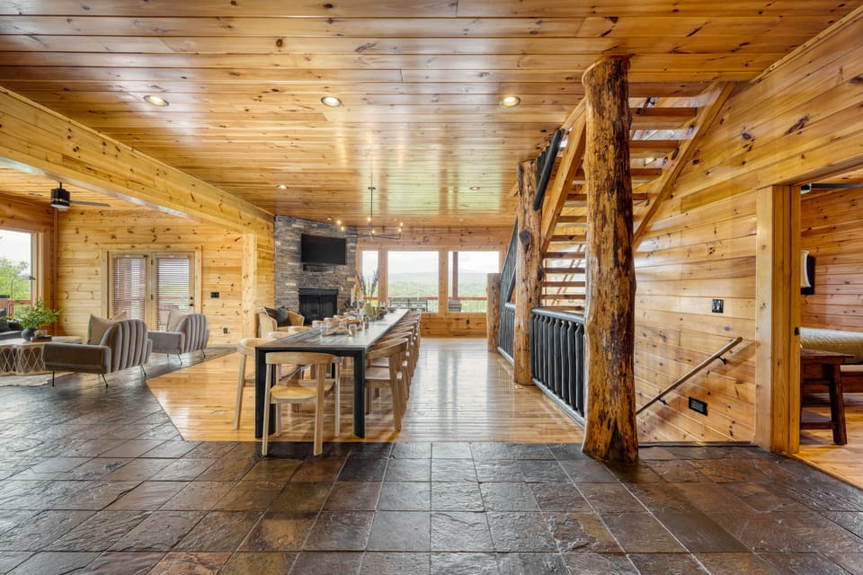 The main living room is on the second floor and features a sitting area, dining area, and large kitchen.