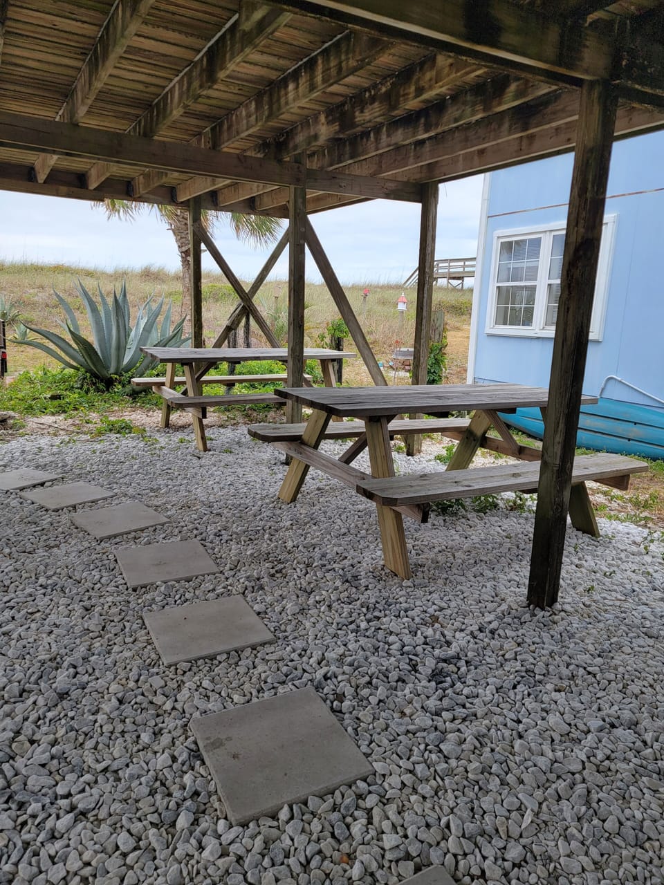 Outdoor seating area out from the downstairs living area and below the rear deck
