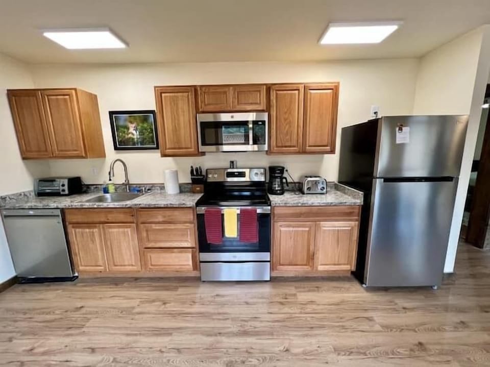 (2) fully equipped kitchen 