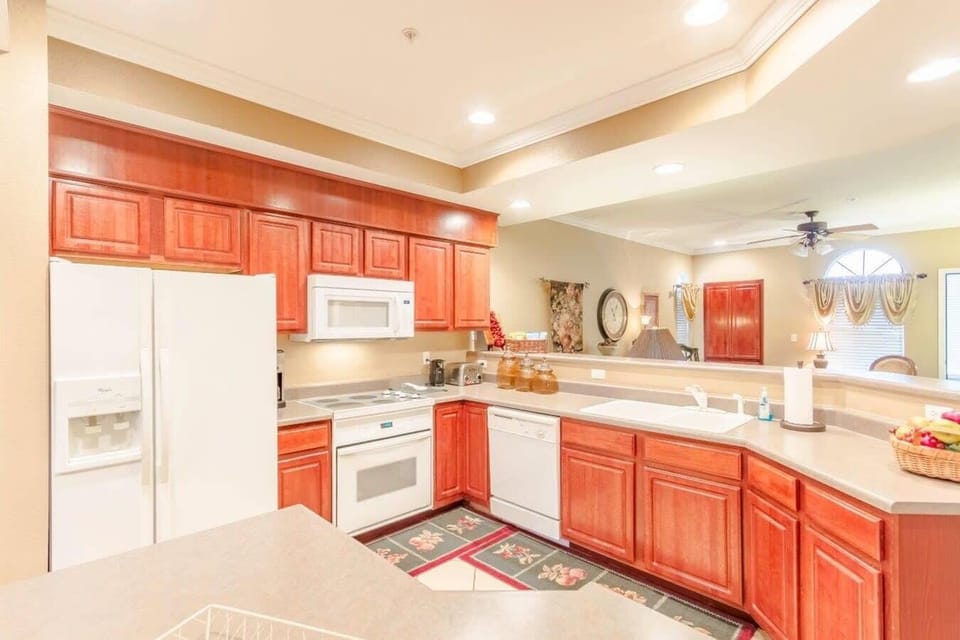 The Kitchen is opened to Dinning and Living Room.