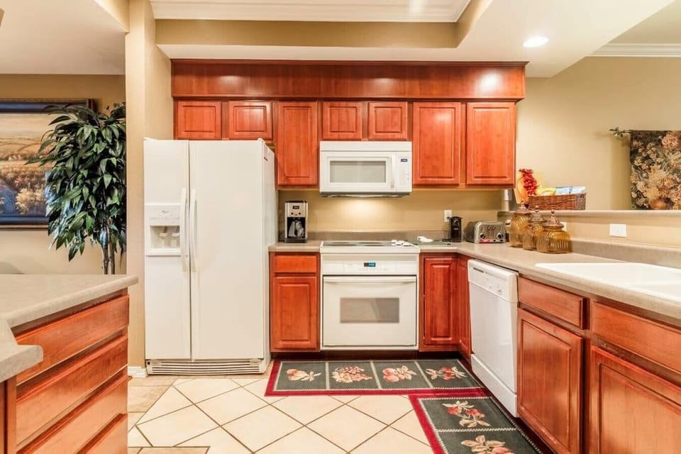Kitchen equipped with full size Appliances.