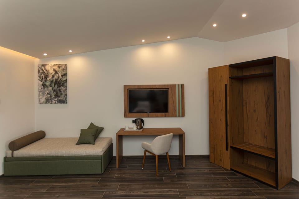 Premium bedding, down comforters, pillowtop beds, minibar