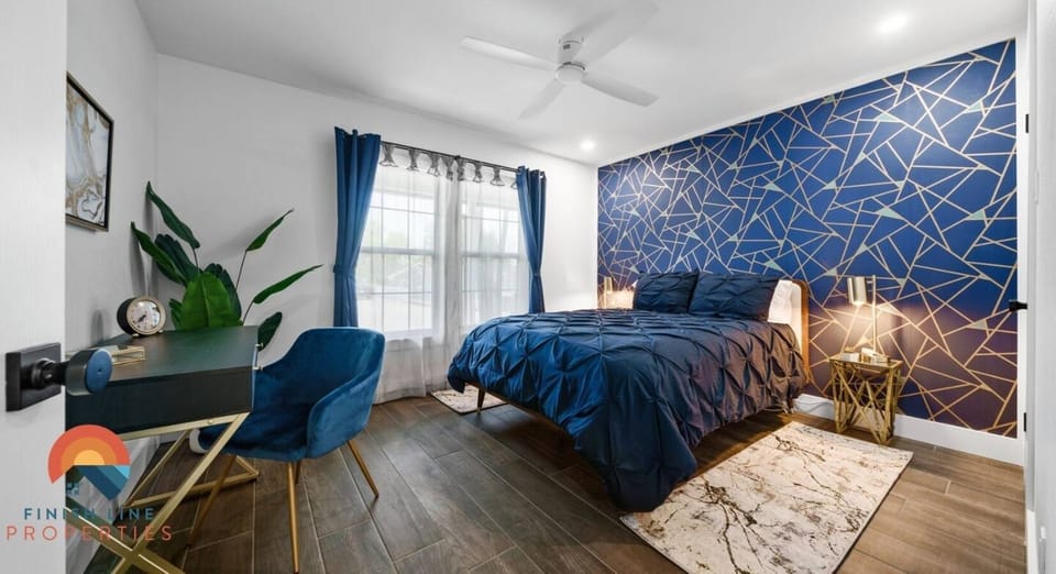 Bedroom 1 / Queen size bed and work station.