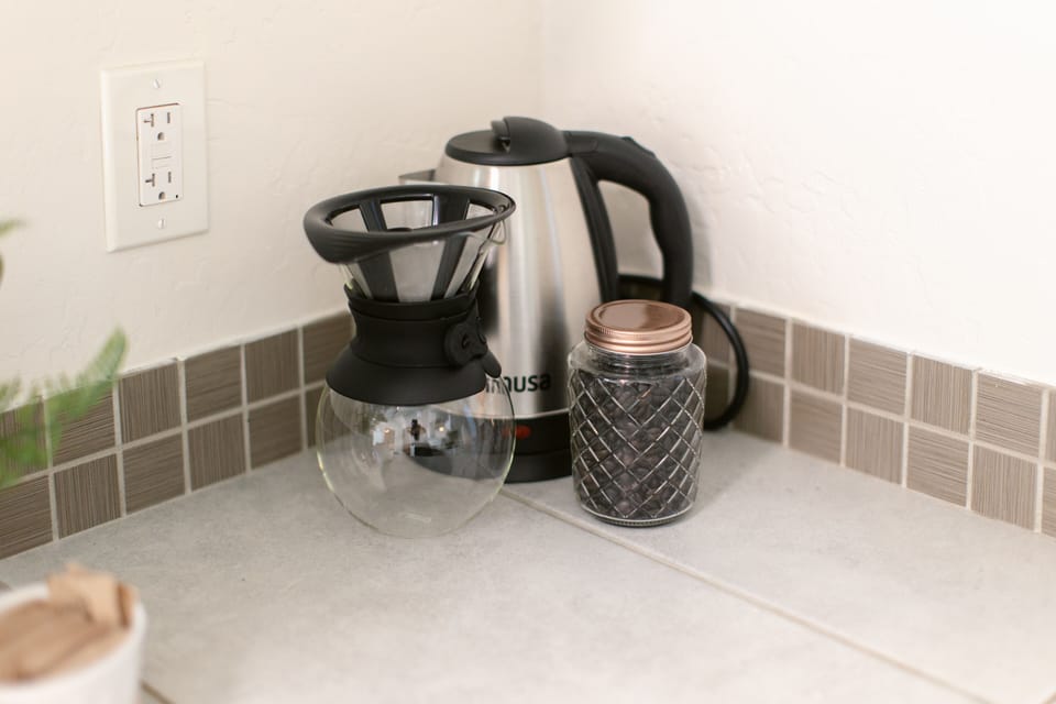 Start your day right with the rich aroma of freshly ground coffee beans. the perfect brew awaits.