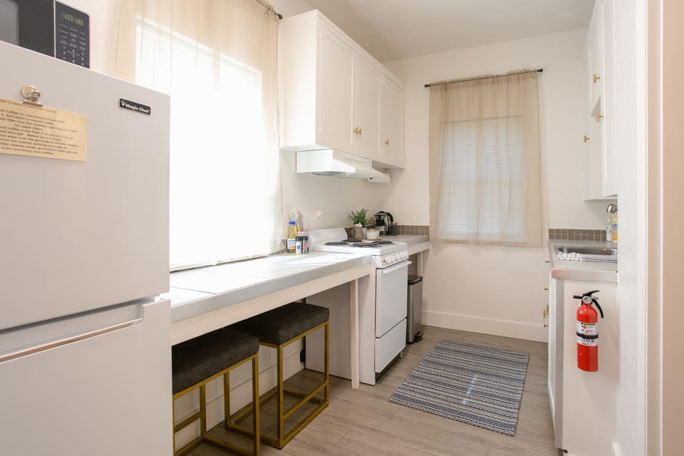Cook, create, and entertain with ease in a fully stocked kitchen, designed for every culinary need.