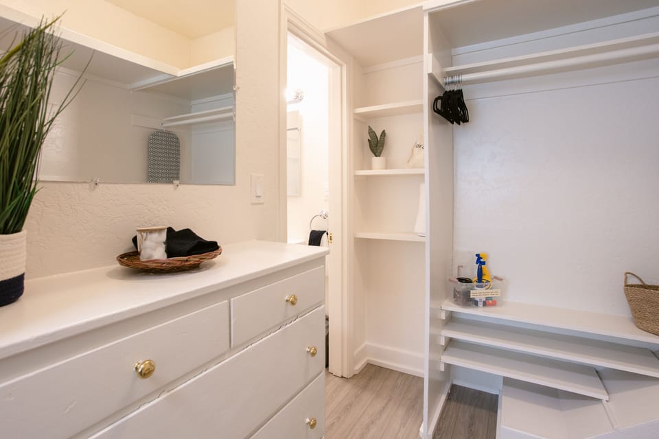 Plenty of room for your wardrobe and essentials with a clean, minimalist design.