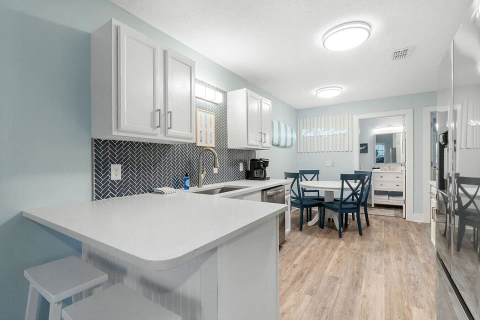Full Size Kitchen and Dining Areas with Bar Seating