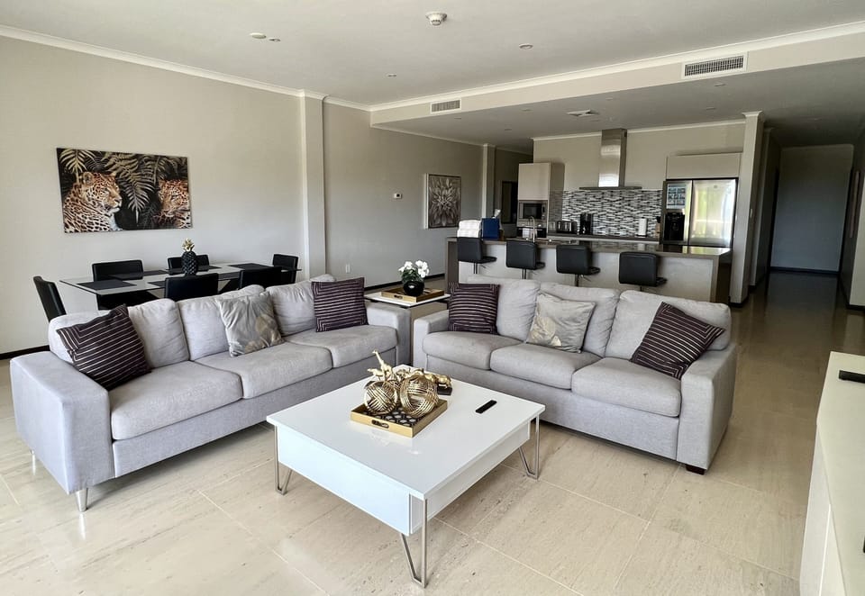 Stunning condo living in Aruba.  This living room has a pull-out sofa bed.