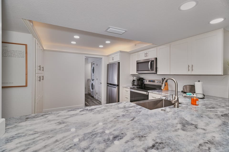 Plenty of prep space and top-tier appliances make home-cooked meals enjoyable and easy.
