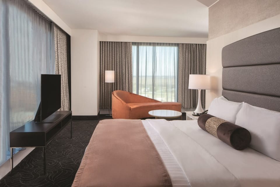 Suite, 1 King Bed, Corner | Premium bedding, pillowtop beds, individually decorated, desk