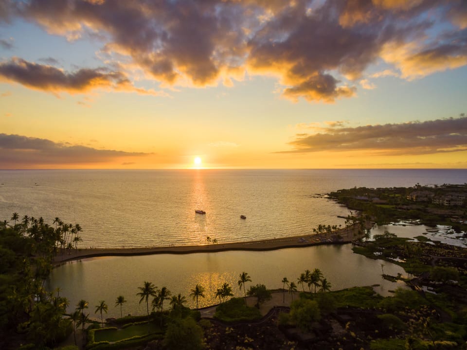 Breathtaking sunset over the ocean with golden reflections.