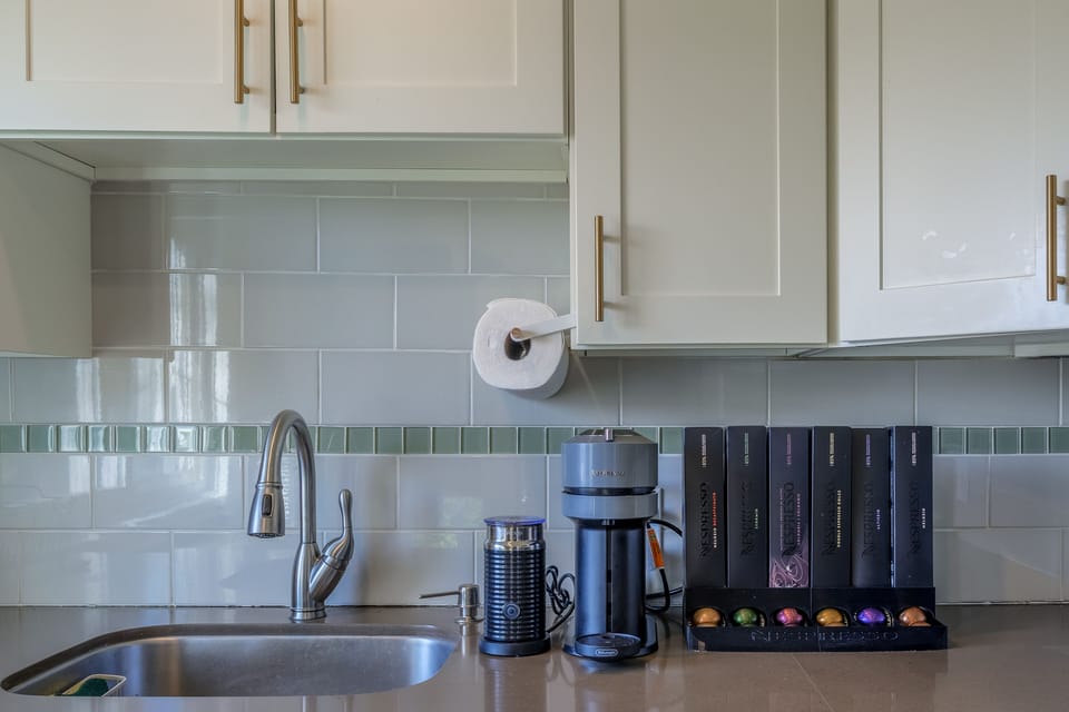 Indulge in a coffee lover's paradise with our fully stocked Nespresso Bar