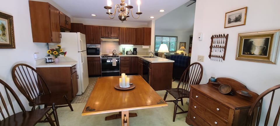 Dining area open to the kitchen and living room.