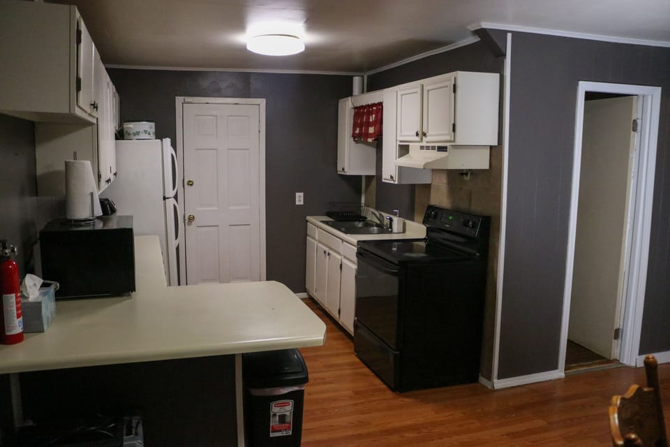 Kitchen includes oven, microwave, coffee pot (brew & k-cup).  No dishwasher.