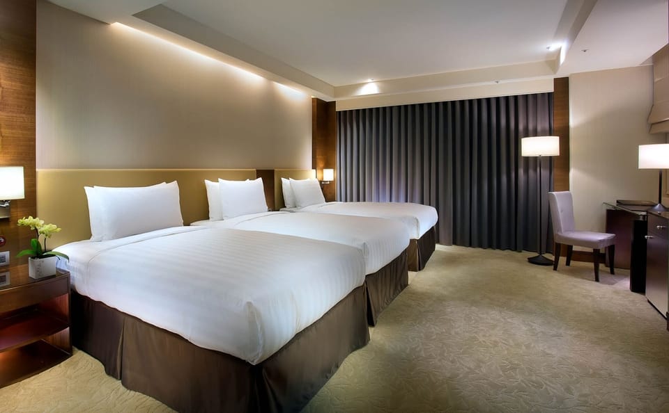 Deluxe Triple Room | Premium bedding, down comforters, minibar, in-room safe