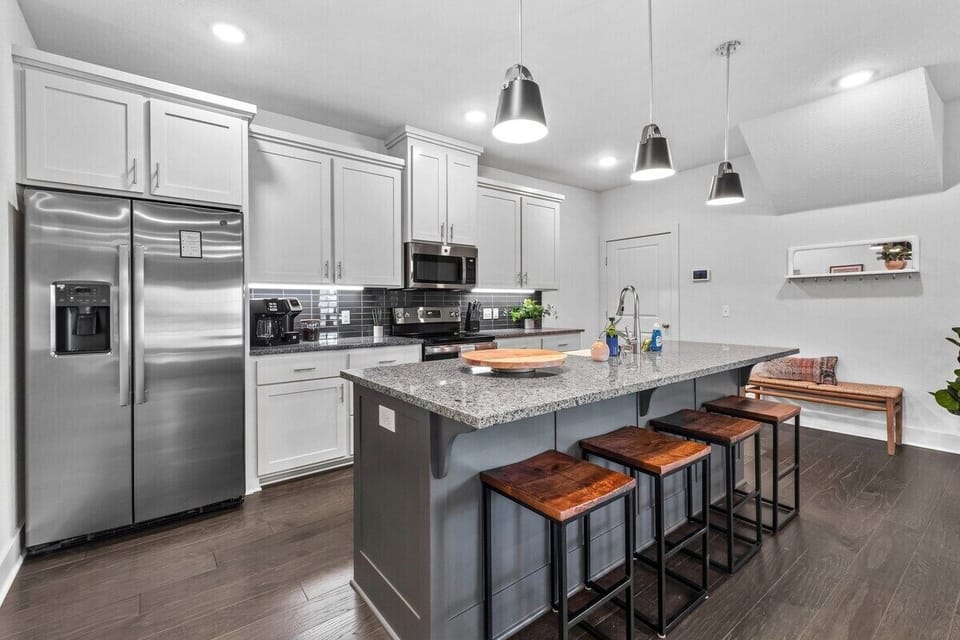 In the center of our kitchen, you'll see our large, granite-top island.