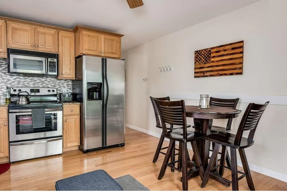 Full sized refridgerator and kids-sized utensils for little ones.