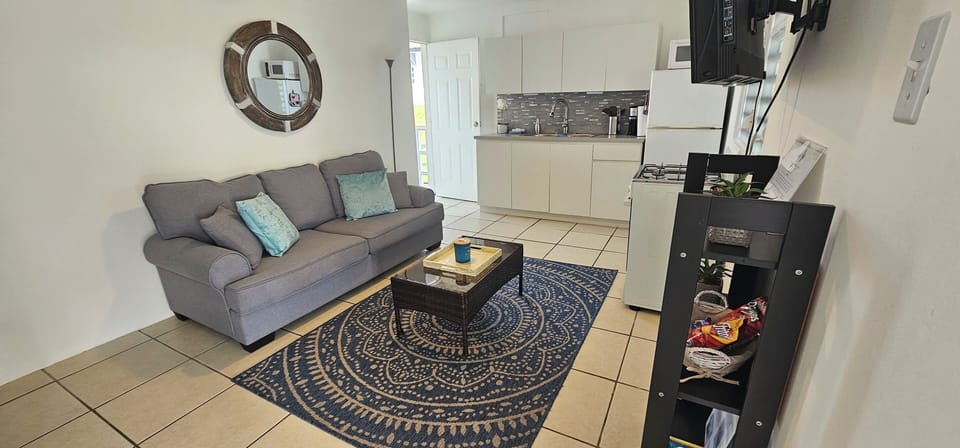 Suite 2 main living room with Wi-Fi and smart tv and full kitchen.