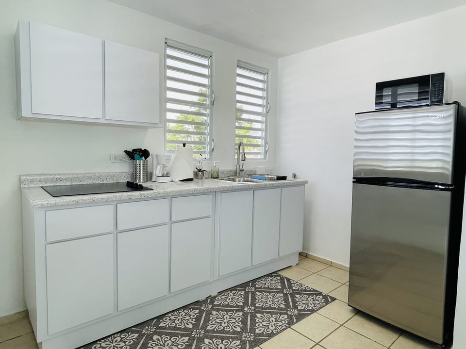 Suite 1 Fully stocked kitchen with all the essentials to cook during your stay.