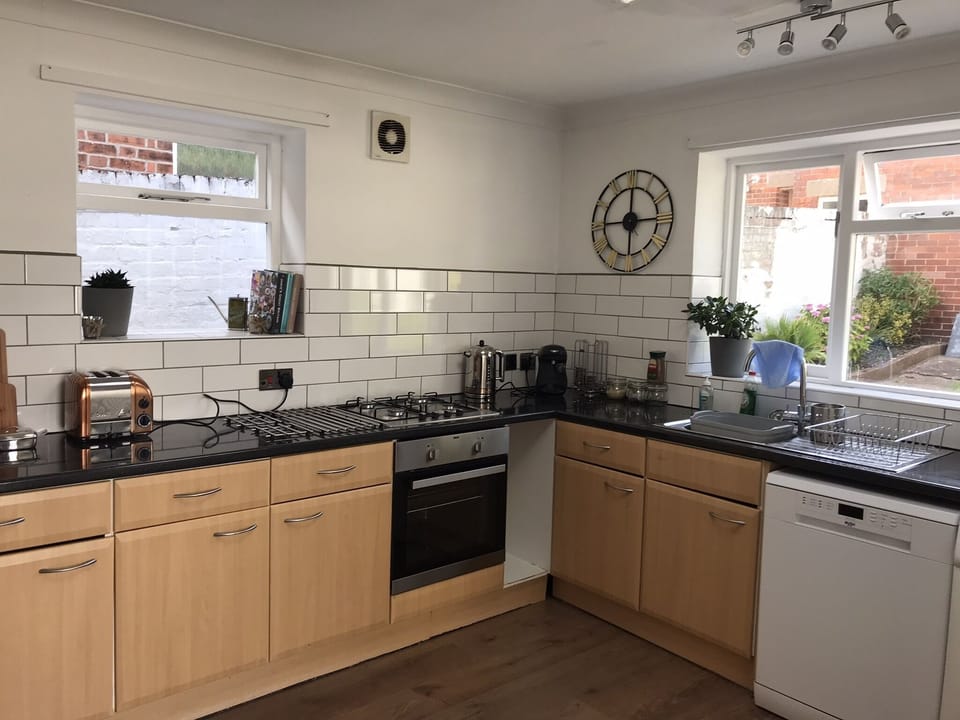 Fully equipped kitchen including new dishwasher and coffee pod machine.