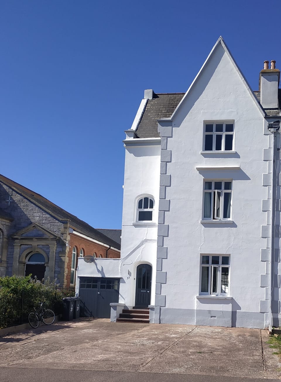 In town but still a calm and peaceful house. Parking for at least three cars.