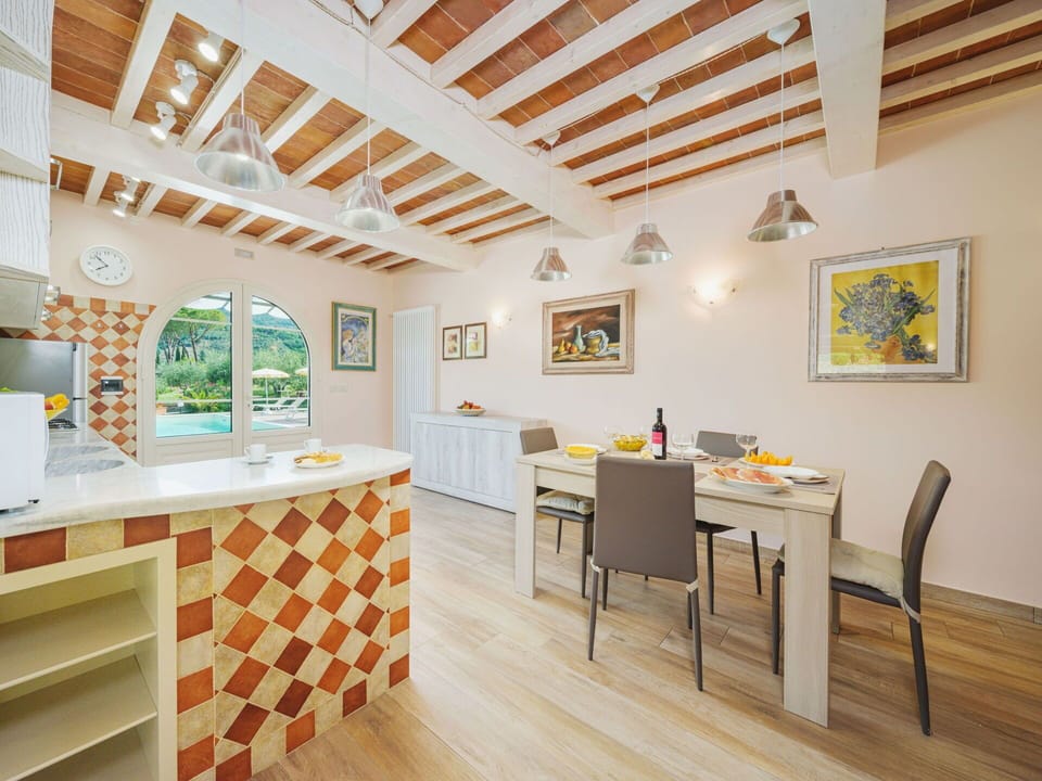 Furniture, Property, Cabinetry, Table, Picture Frame, Wood, Interior Design, Flooring, Living Room, Floor