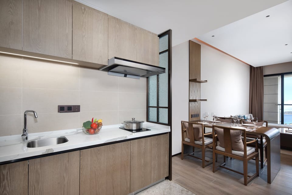 Suite, 2 Bedrooms (Dining Area) | In-room safe, desk, blackout drapes, soundproofing