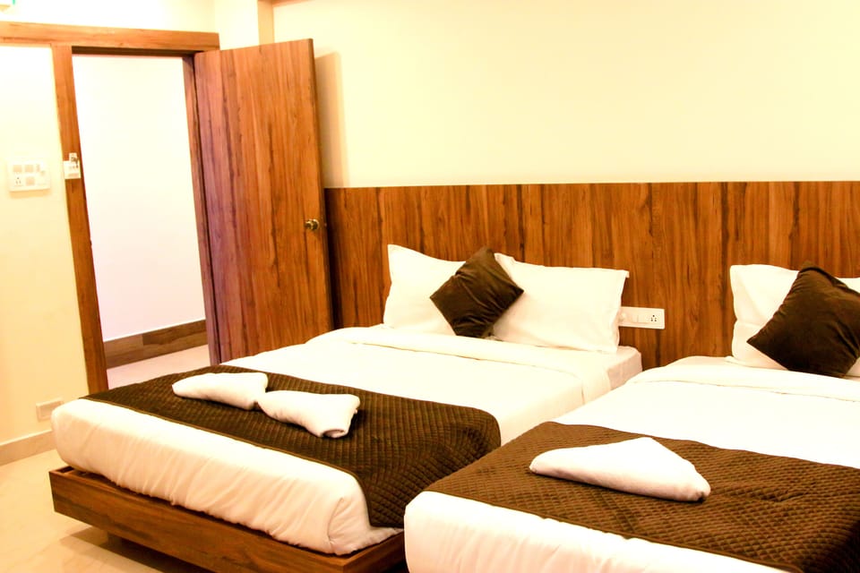 Standard Triple Room | Premium bedding, desk, laptop workspace, blackout drapes