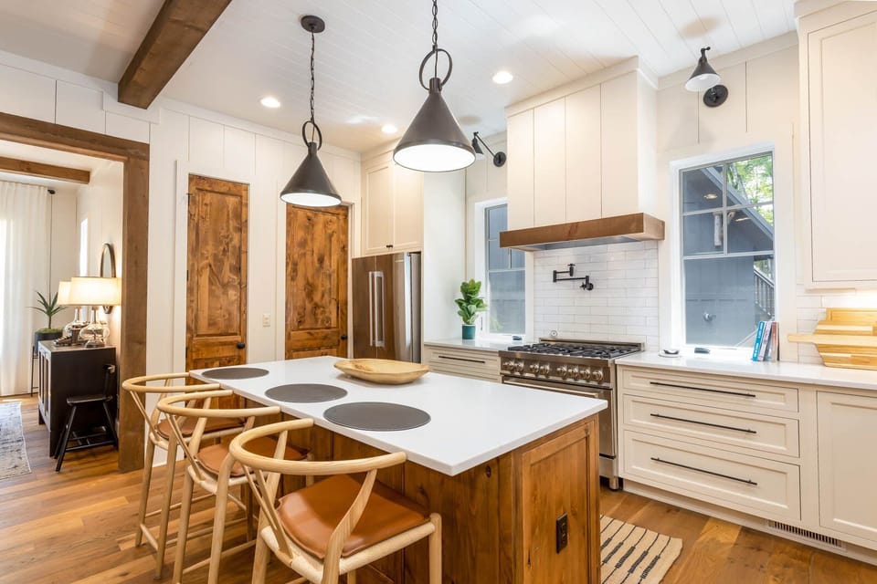 Kitchen Island Seating, Stainless Fridge and Gas Stove and Oven