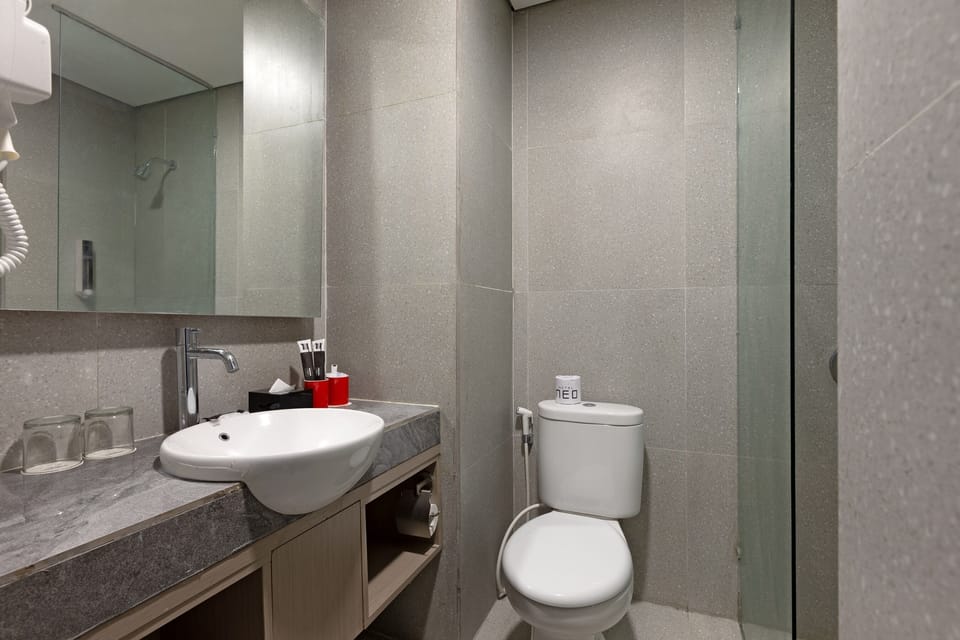 Shower, free toiletries, slippers, towels