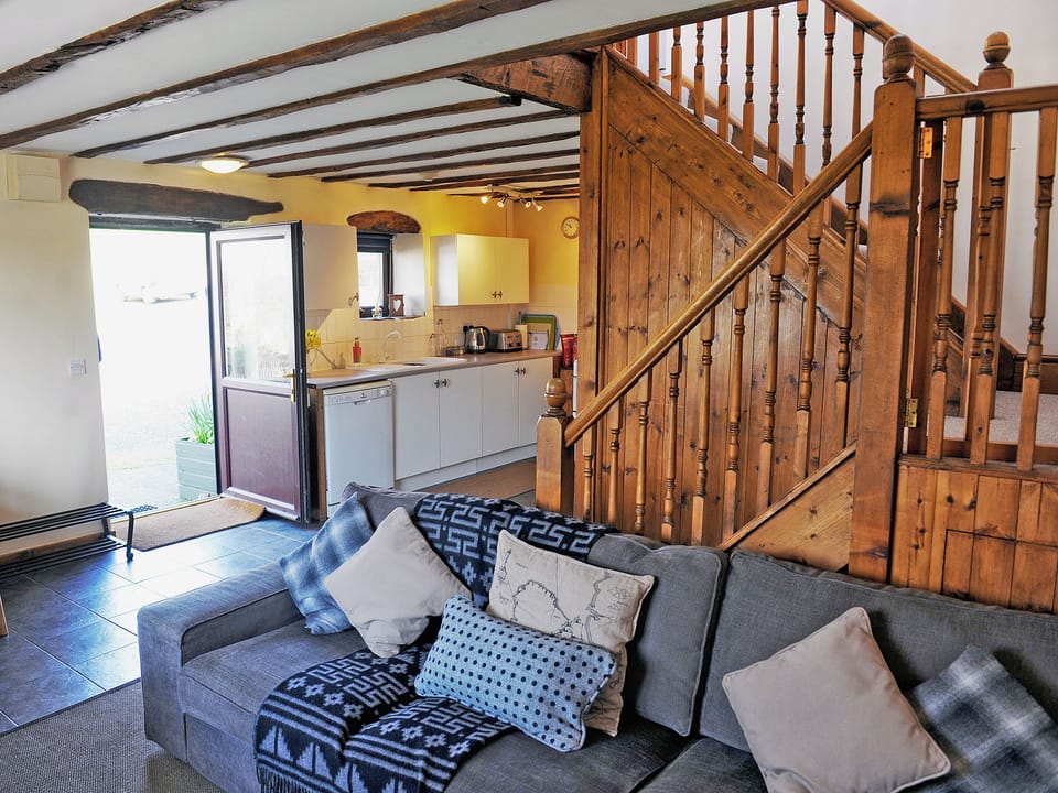 Open plan living/dining room/kitchen | Coastal Wood Holidays - Granary Barn, Marros, nr. Amroth