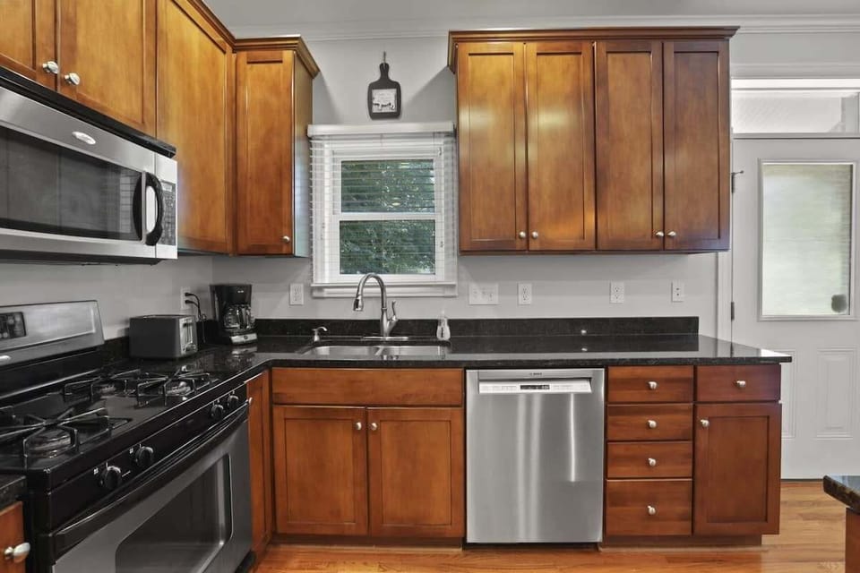 Stainless steel appliances and granite counters throughout