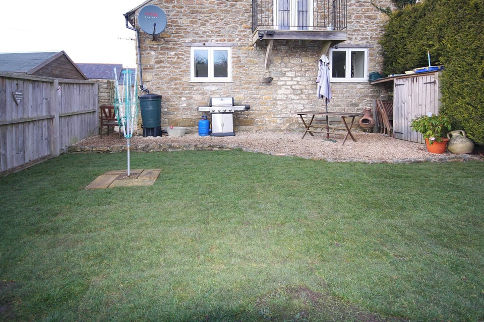Garden with sitting out area and childrens games | The Cider Press, Watton, near Bridport