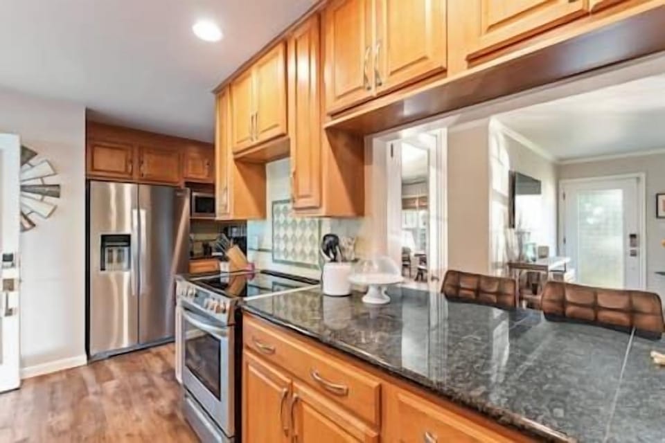 Cook with ease in a fully equipped kitchen, featuring modern appliances and everything you need to create delicious meals during your stay.