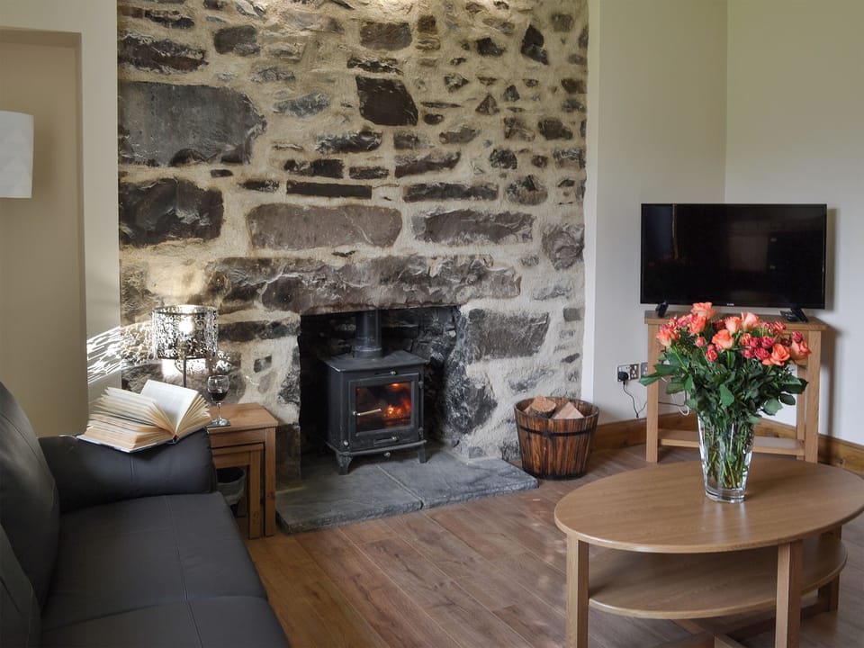 Living room with wood burner | Cliff Cottage, Kyle of Lochalsh