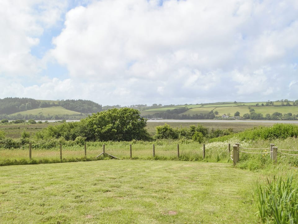 Lawned garden area | Bronyn Cottage - Bronyn Farm, Ferryside, near Carmarthen