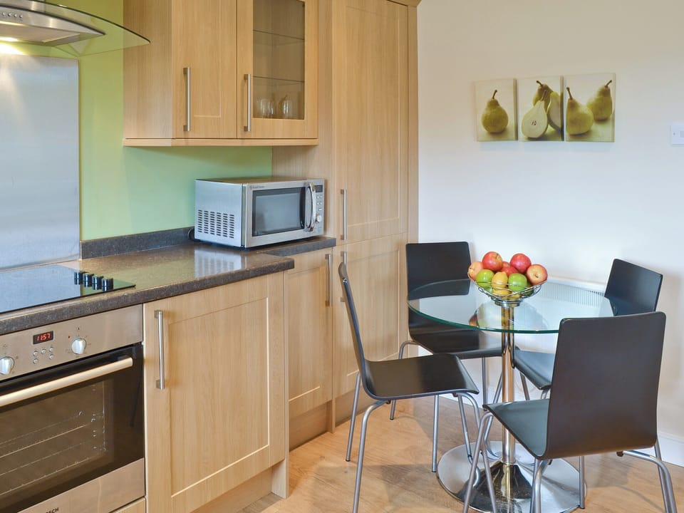 Convenient dining area in well-equipped fitted kitchen | Coastal Retreat, Beadnell