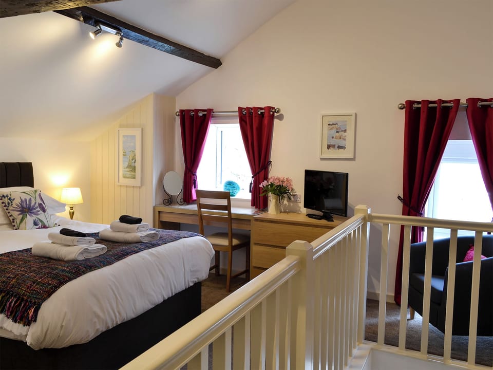 Relaxing bedroom with kingsize bed and beams | Farmhouse Cottage - Wallace Lane Farm Cottages, Brocklebank, near Caldbeck and Uldale