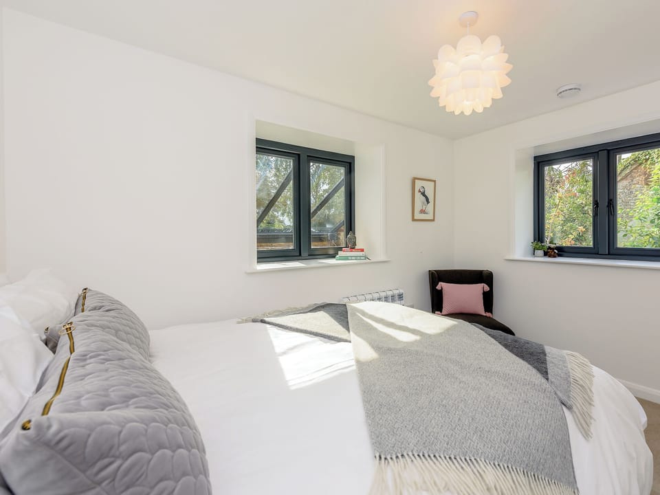 Comfortable double bedroom | The Lodge at Oldbury Barns, Chichester