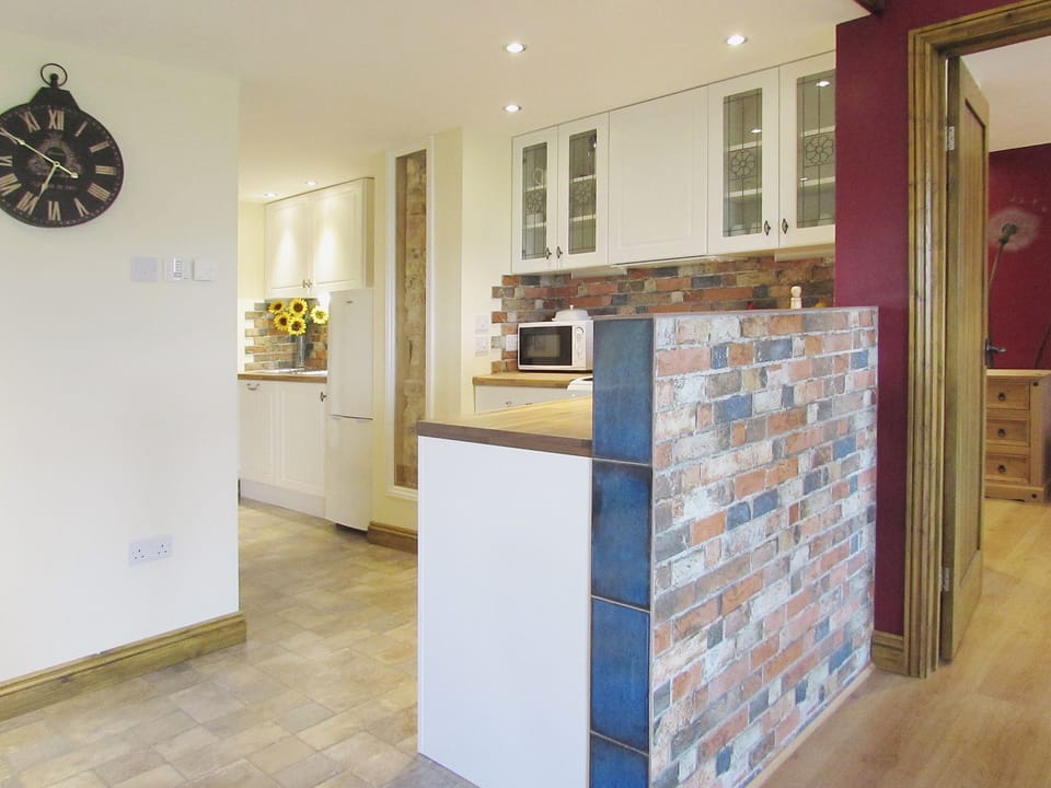 Compact and modest kitchen area | Sedge Lodge - Wood Fen Lodges, Little Downham, near Ely