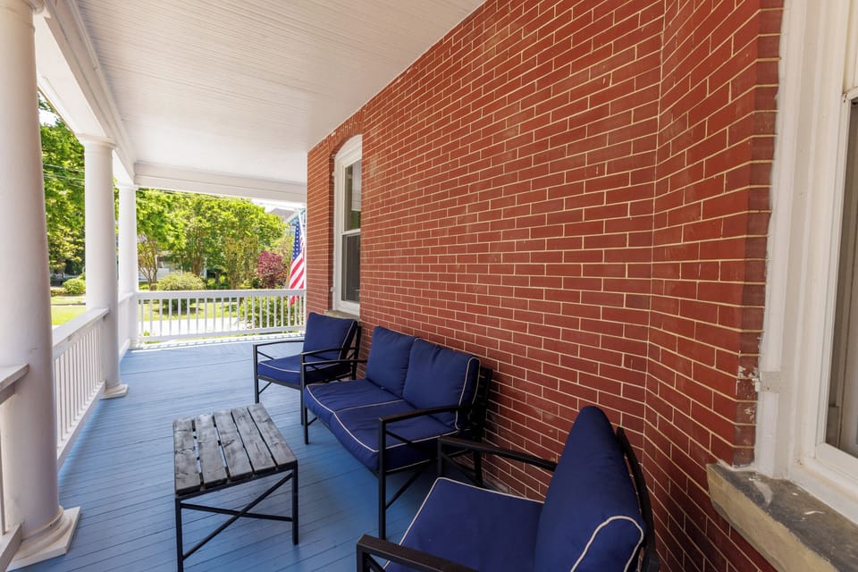 Large Wrap around porch with privacy around the corner if a guest is to stay in the other unit.