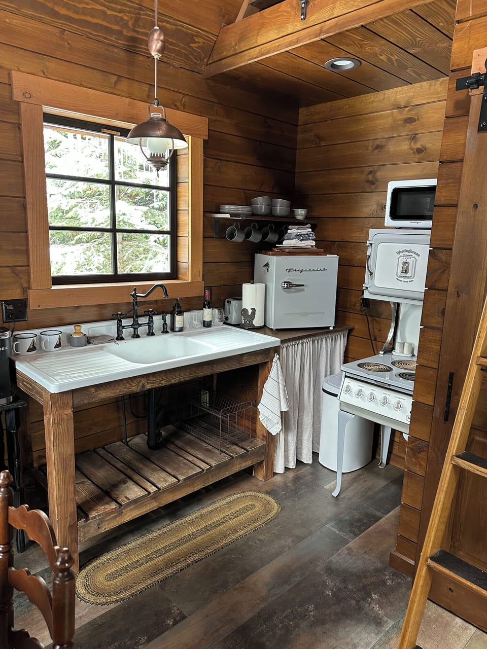 Vintage sink and mini refrigerator.
