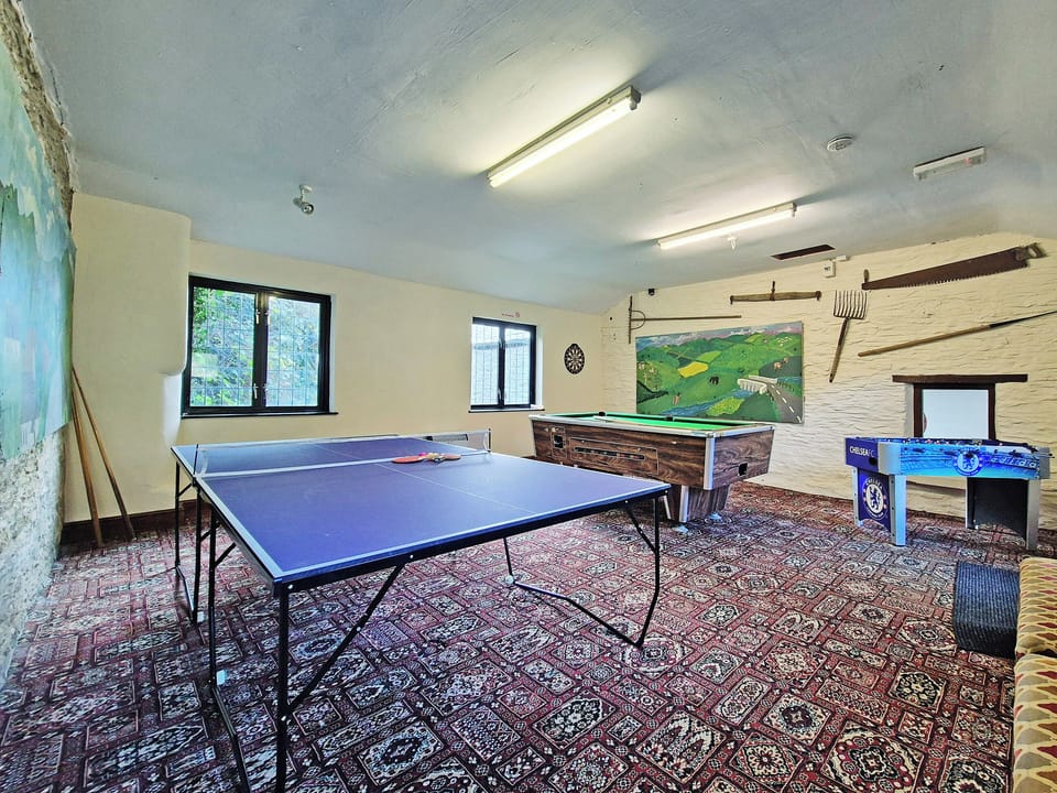 Indoor communal games room with pool table, table tennis, child&rsquo;s football game and magnetic darts | Stream Cottage - Triscombe Farm Country Cottages, Wheddon Cross, Exmoor