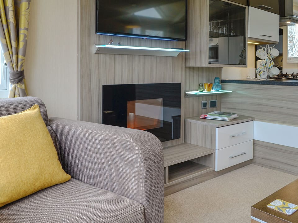 Comfy living area | Skylark Lodge - Wallace Lane Farm Cottages, Brocklebank, near Caldbeck and Uldale