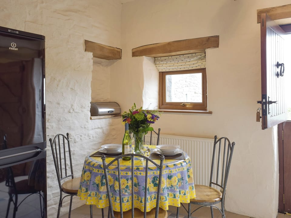 Dining area within kitchen | Hayloft Cottage - Croft Farm Cottages, Ludchurch, near Narberth