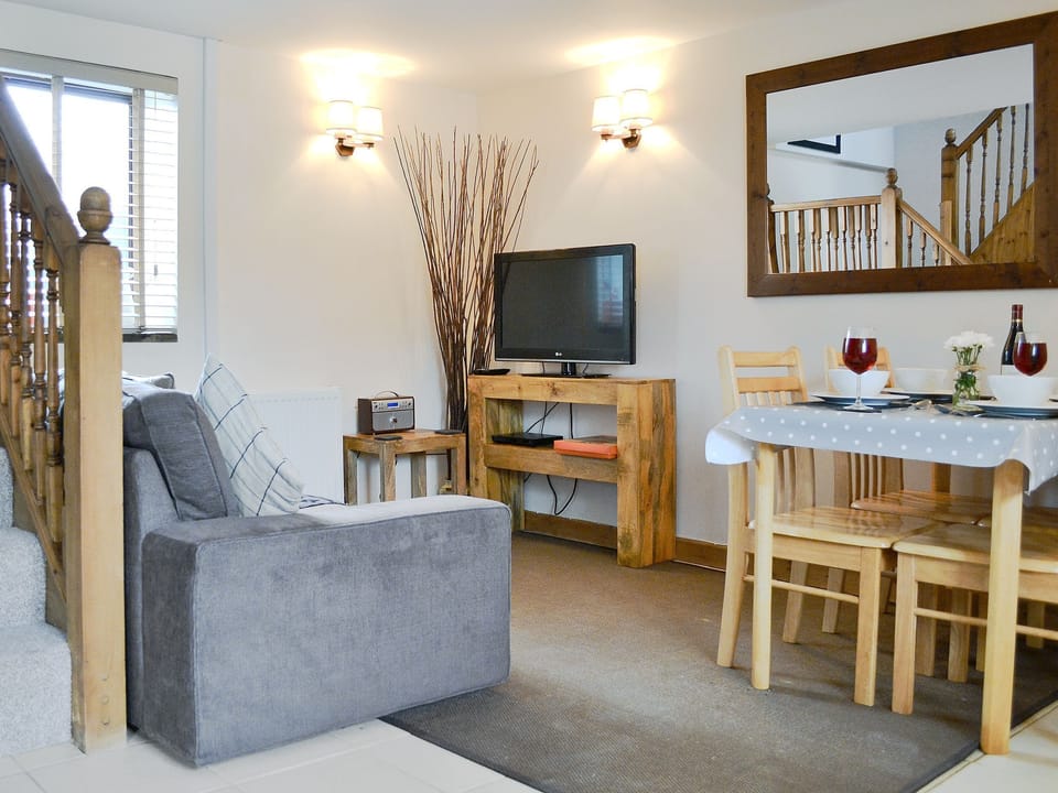 Open plan living/dining room/kitchen | Coastal Wood Holidays - Keeper&rsquo;s Cottage, Marros, nr. Amroth